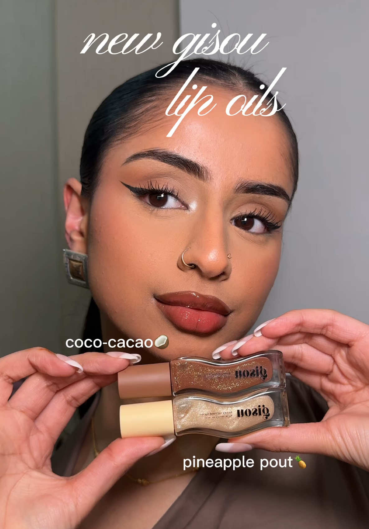 TikTok post by @kaynatt.m for Gisou. Caption reads: day to night ft. the NEW @Gisou honey-infused lip....