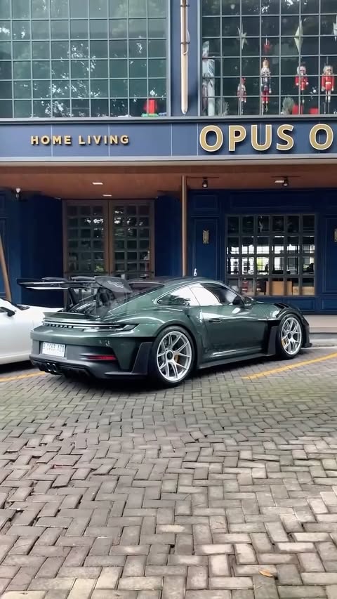 Instagram post by @exoticcarsbandung for Porsche. Caption reads: Make Green Great Again 😍

#porsche #992....