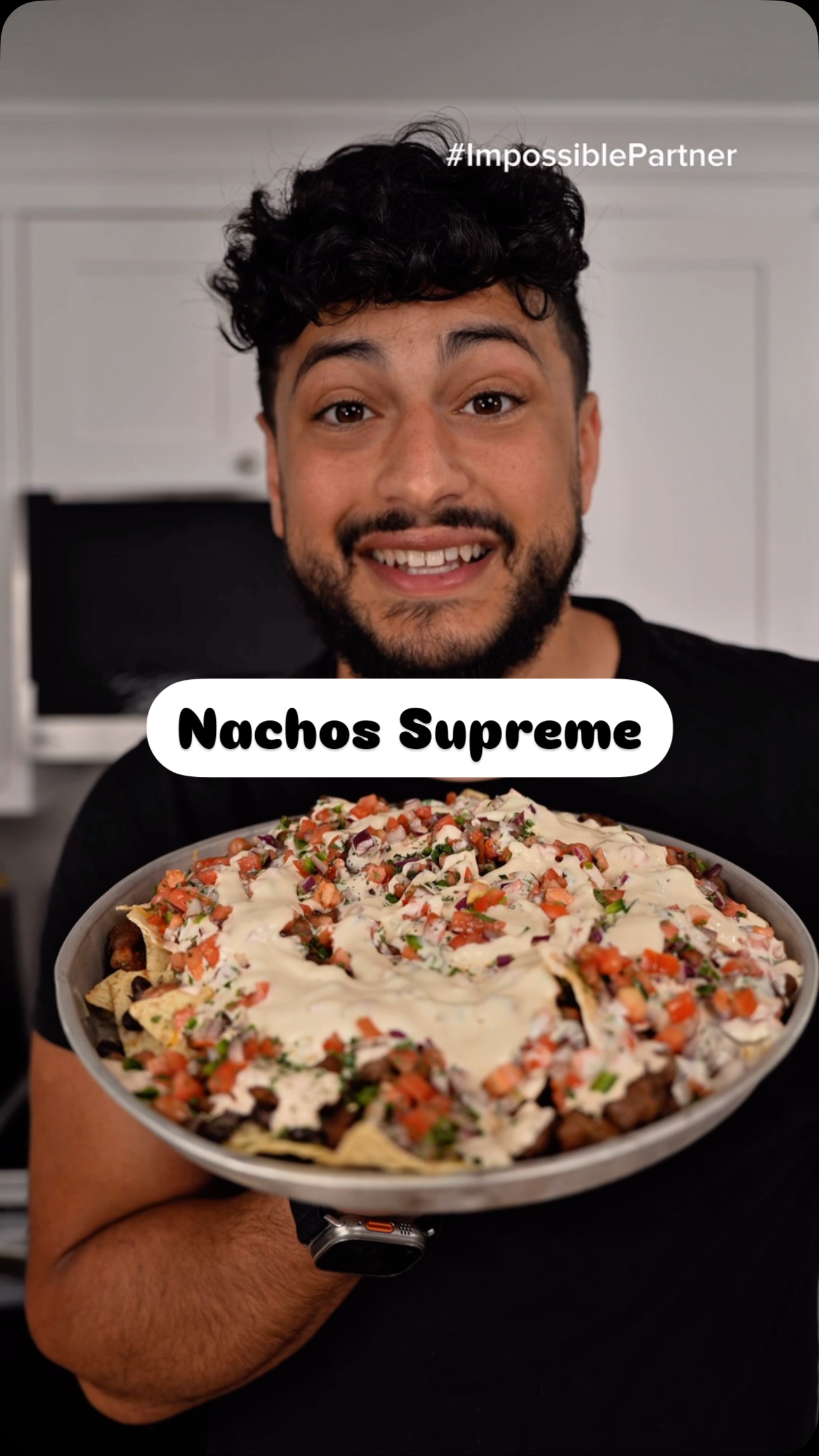 Instagram post by @thegoldenbalance for Impossible Foods. Caption reads: Nachos Supreme With Steak Bites From Plants -....