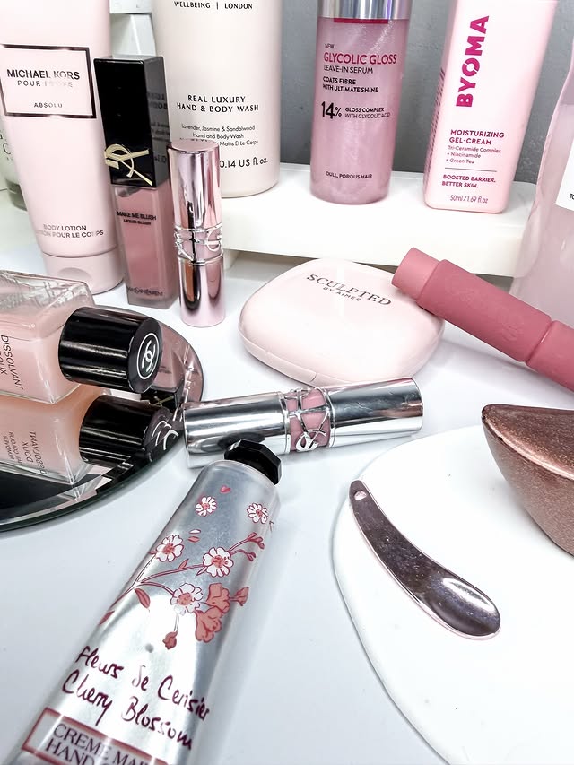 Instagram post by @beauty_with_ju for NEOM. Caption reads: Some of my current pink favorites to celebrate....