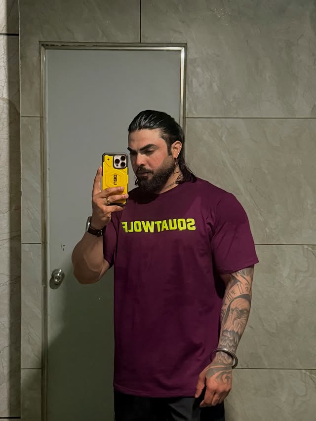 Instagram post by @fitness_sandhu47 for SQUATWOLF. Caption reads: @squatwolf #fitness.