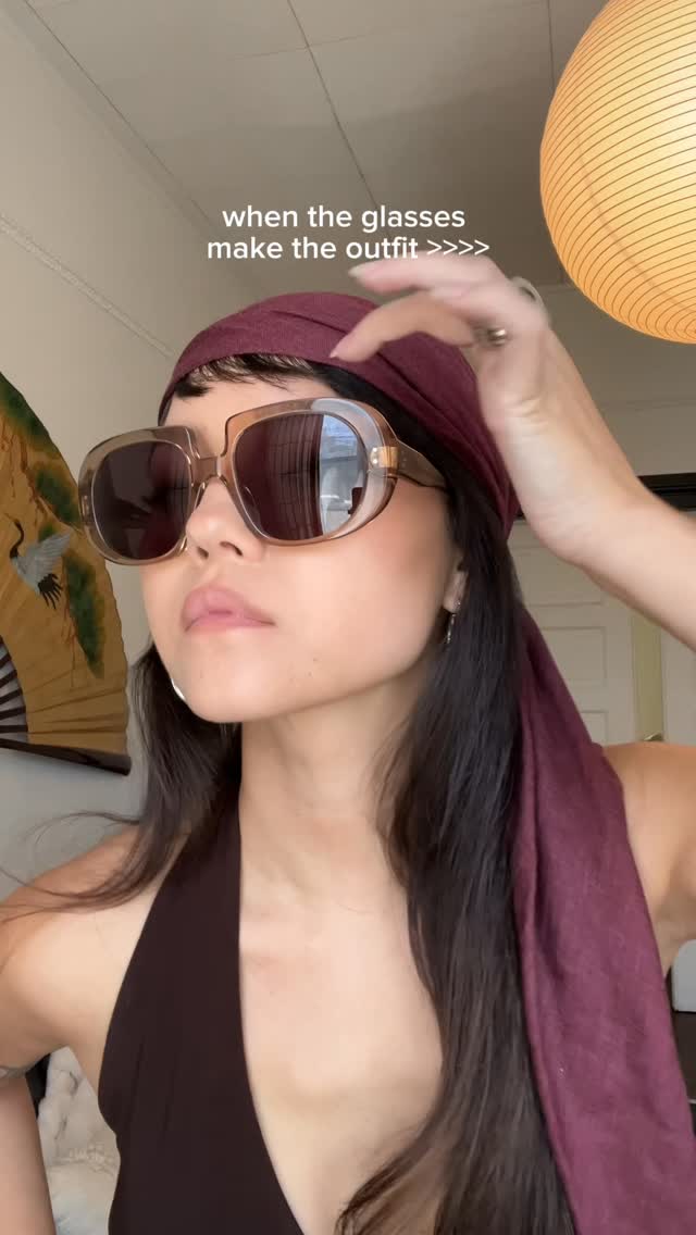 Instagram post by @emmyqandrews for EyeBuyDirect. Caption reads: Styling my most asked about glasses from....