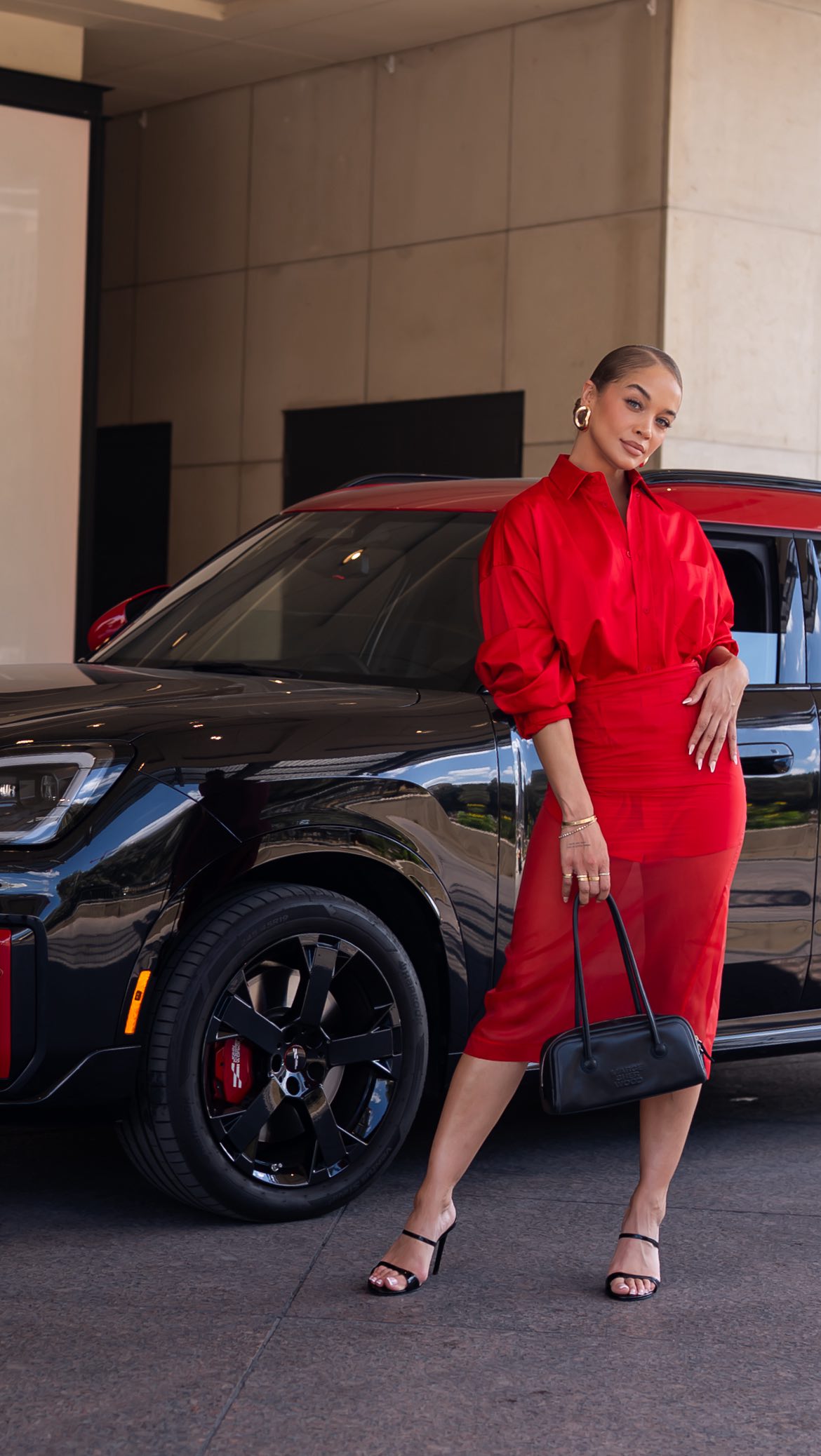 Instagram post by @goldenbarbie for Sports Illustrated. Caption reads: Fast cars, bold confessions, and Austin energy!....