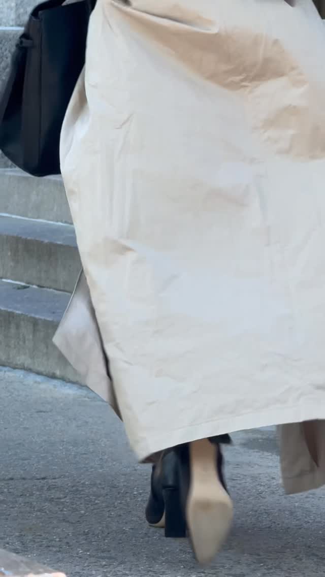 Instagram post by @cocobaudelle for STAUD. Caption reads: just a ny busy girl 🤍 @staud.clothing #ad.