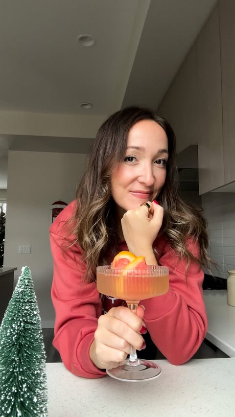 Instagram post by @basicswithbails for 1UP Nutrition. Caption reads: Protein Grapefruit Protein Mimosas 🥂🎄

Brunch....