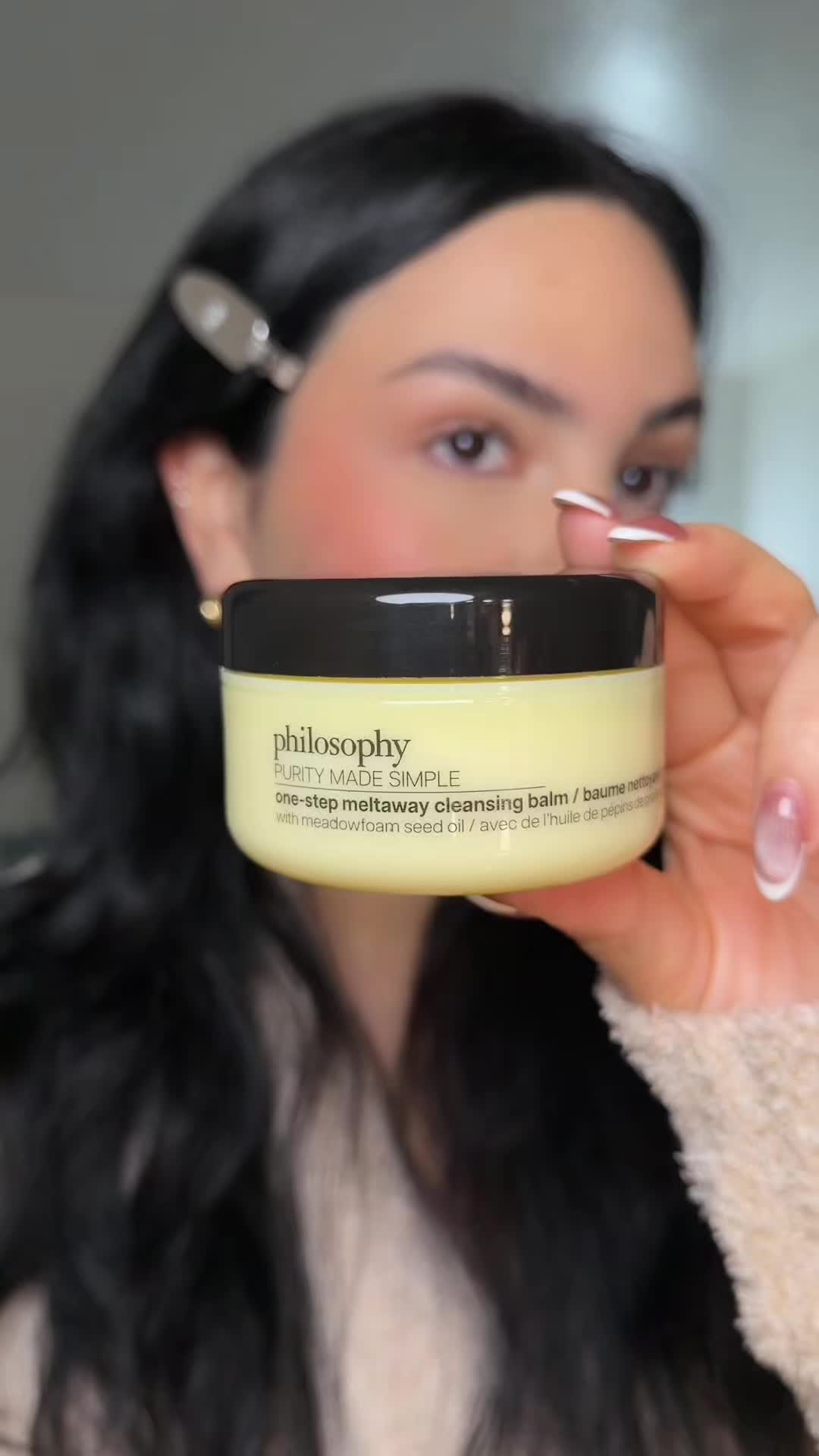 TikTok post by @jennycva for philosophy. Caption reads: @philosophy Purity One-Step Cleansing Balm 🫧....
