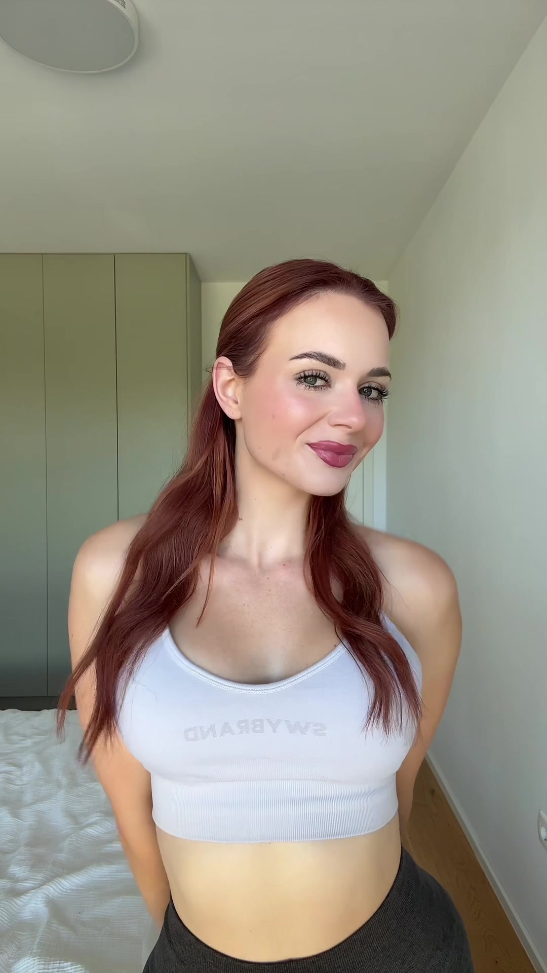 TikTok post by @gajahribernik for SWYbrand. Caption reads: Še kr se nism čist navadla 🙈 Outfits: @swybrand....