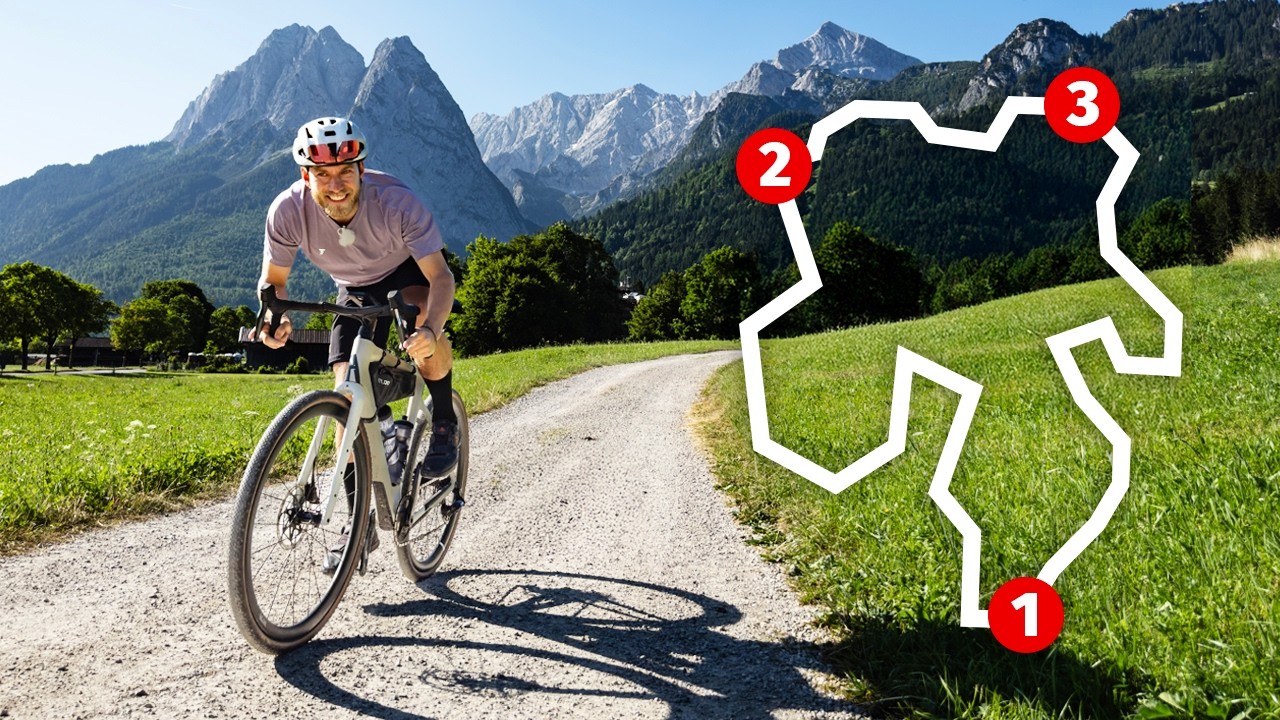 YouTube post by @Marius_Quast for komoot. Caption reads: Epic Bike Tour at Germany's Highest Mountain —....