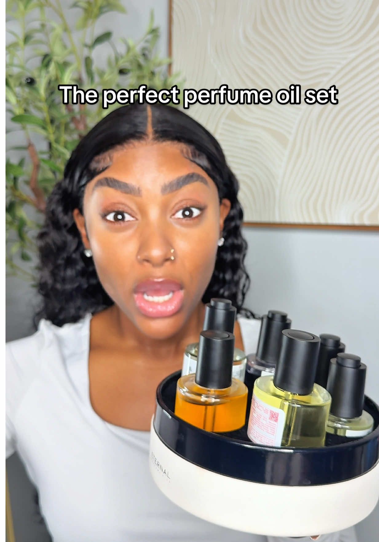 TikTok post by @petite3ssence for Eternal Perfume Oils. Caption reads: Holy grail perfume oil set @Eternal Perfume Oils ....