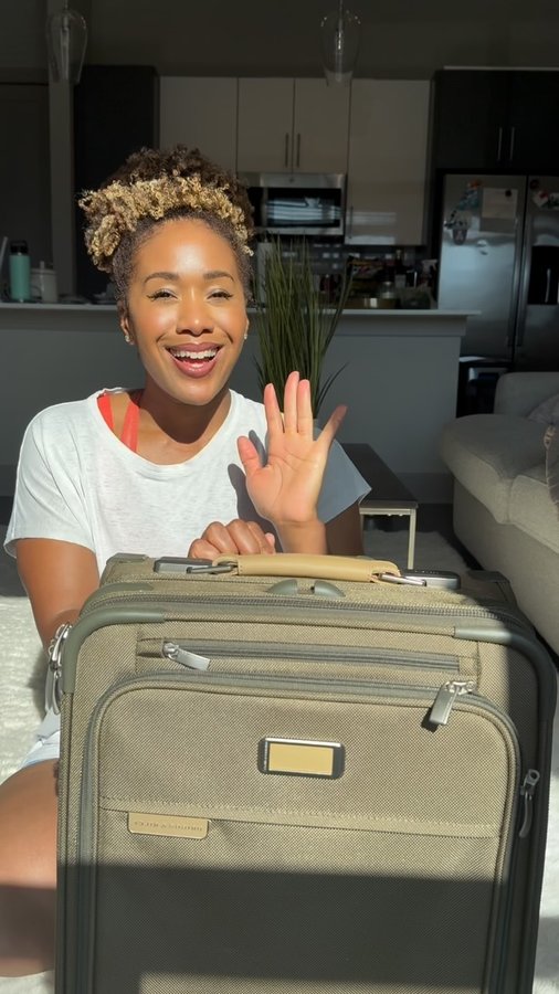 Instagram post by @tiffblackmon for Briggs & Riley. Caption reads: Most travel days I’m calculating what can or can’t....