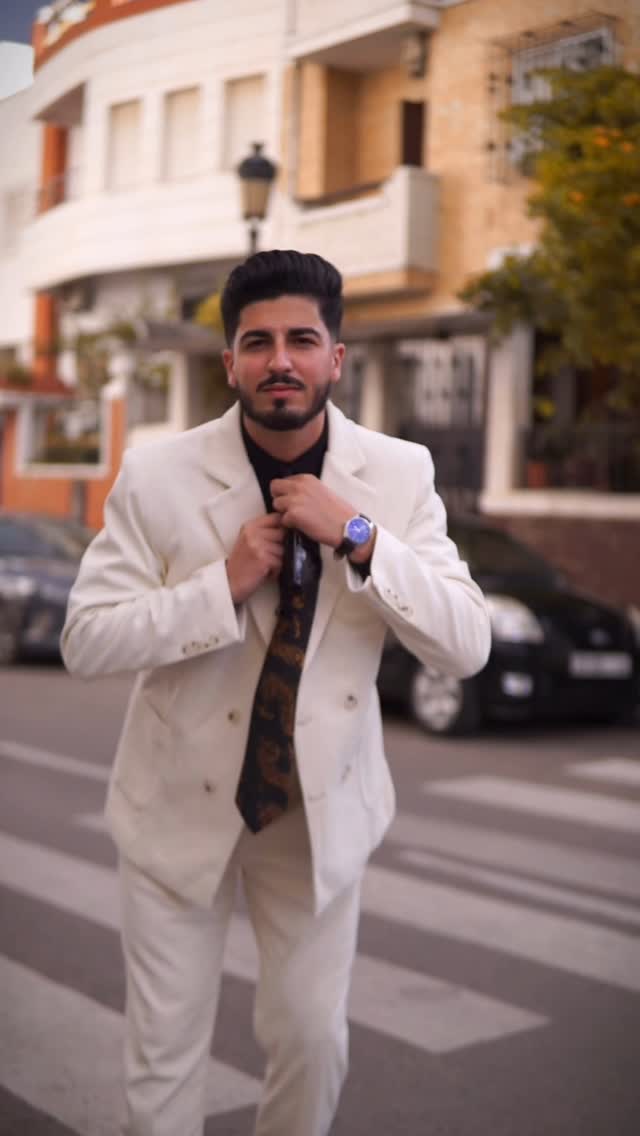Instagram post by @imad_elkachkach for Wehilion. Caption reads: [...] This ivory double-breasted suit by @wehilion....