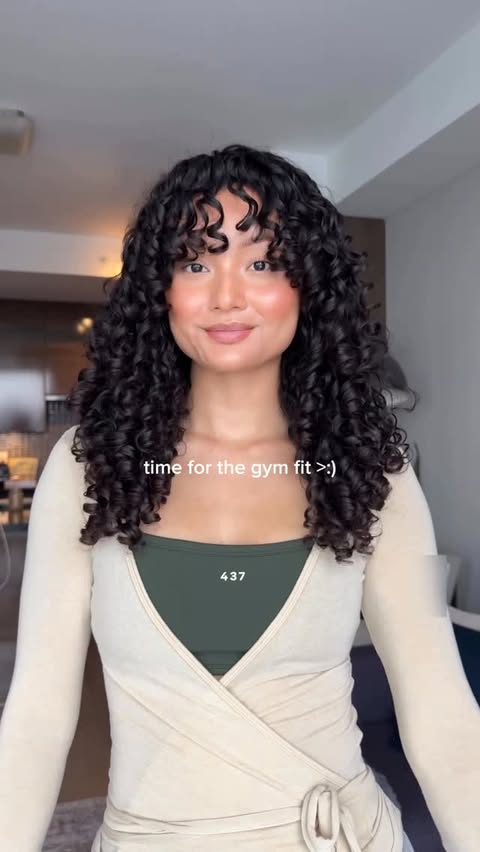 Instagram post by @thatcurlblog for Pattern. Caption reads: when my love for fitness + curls come together....