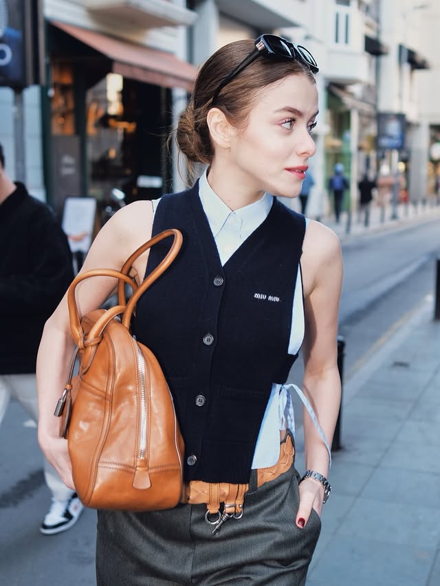 Instagram post by @ilaydalisan for Miu Miu. Caption reads: The bigger the bag better the mood 🌞🌝 @MiuMiu....