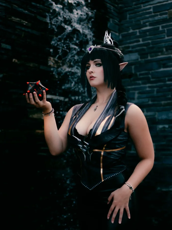Instagram post by @the_best_of_cosplay.2 for CosPositive. Caption reads: "You can't cast a shadow without some light" 🖤....