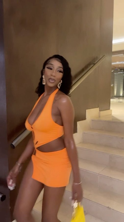 Instagram post by @brownskintee for AMICLUBWEAR. Caption reads: [...] Girl 😘🥰 

Shop This Look At: @amiclubwear....