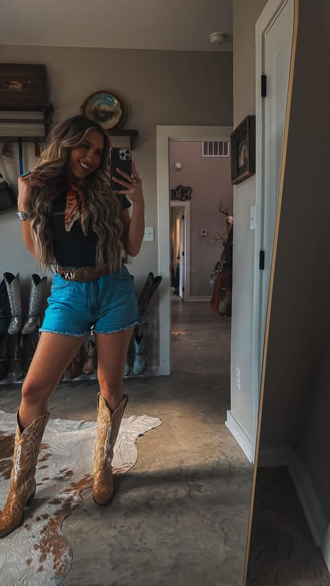 Instagram post by @__morgannicole for Dan Post Boot Company. Caption reads: Hehe…🤎 Can we pause for these new ostrich boots....