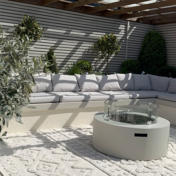 Instagram post by @home_joyr for House Beautiful. Caption reads: [...] #naturalstonefence #baytrees....