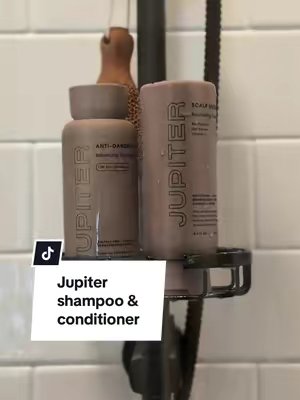 TikTok post by @brianajmahoney for Jupiter. Caption reads: [...] our hair on camera now. 😂🚿 Trying the....