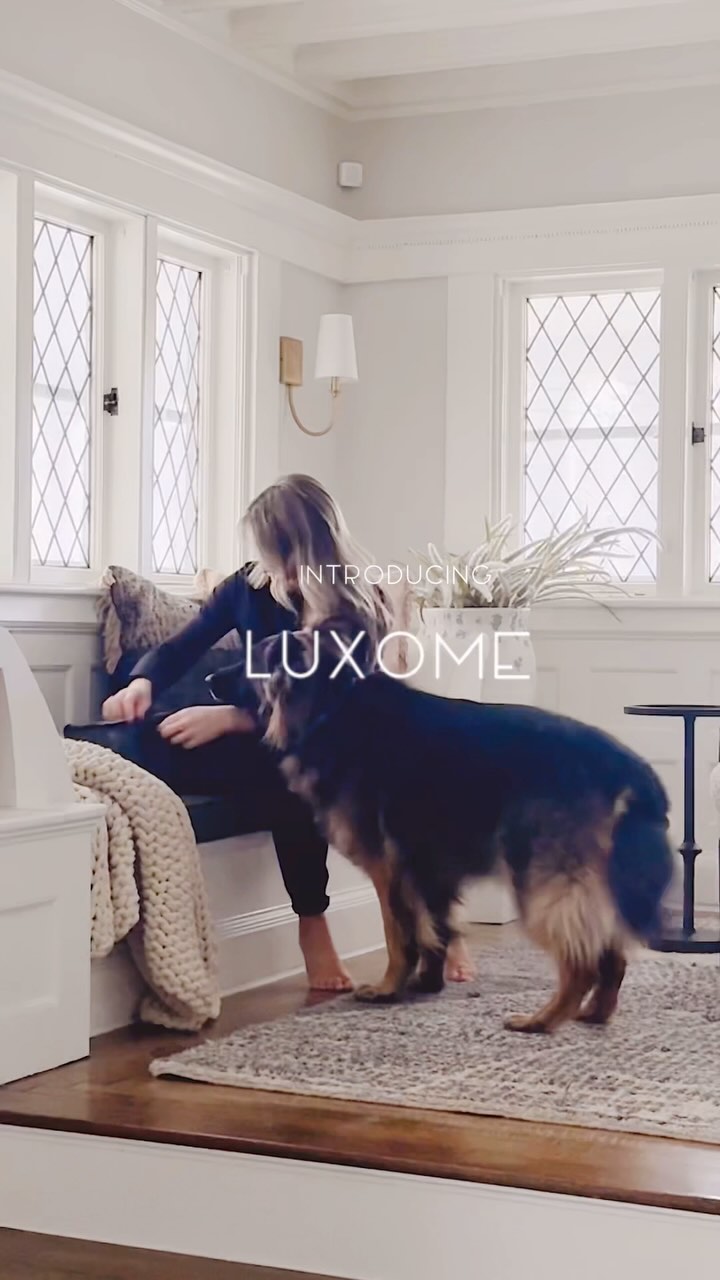 Instagram post by @kasiascreativespaces for LUXOME. Caption reads: This ultra plush throw blanket from @luxome is the....
