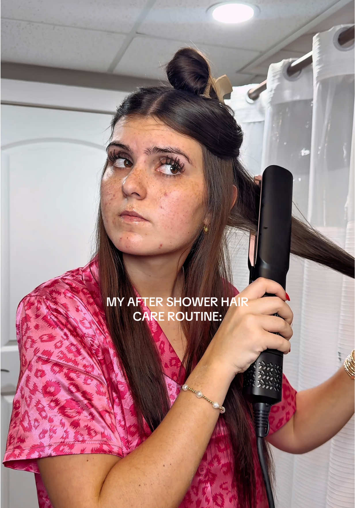 TikTok post by @kambreewhite for L'ange Hair. Caption reads: HOW I GET MY HAIR SO SHINY🙌 everything is 🔗 in....