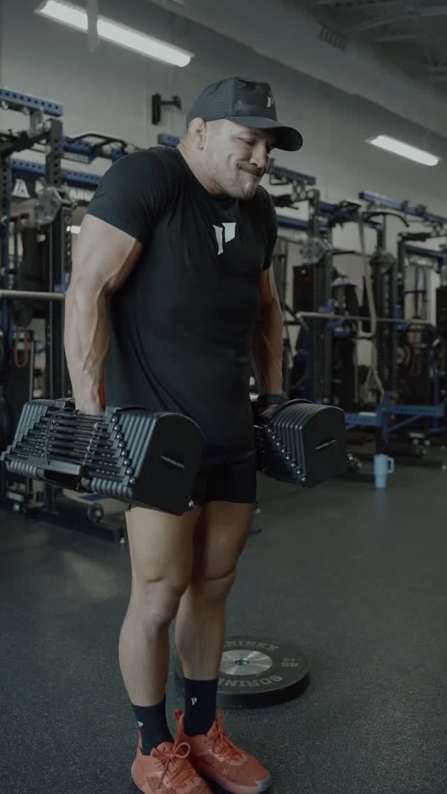 Instagram post by @mikechandlermma for 1st Phorm. Caption reads: #workoutoftheday - just grab the weight and move....