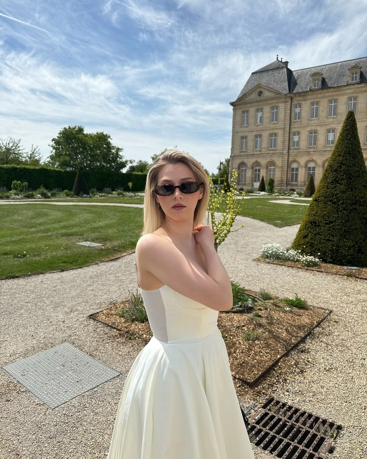 Instagram post by @mariebnnz for SSENSE. Caption reads: [...] elegance with my new sunglasses from @ssense....