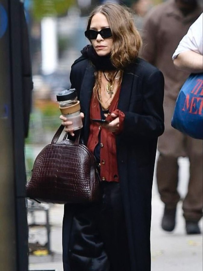 Instagram post by @nenthe for The Row. Caption reads: Secretly ready for fall looks.