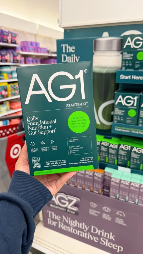 Instagram post by @targetfanatic for AG1. Caption reads: #ad NEW ARRIVAL! @DrinkAG1 is now available at....