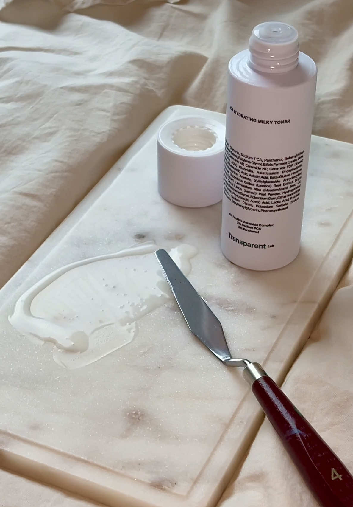 TikTok post by @anastasiia_marich for Niche Beauty Lab. Caption reads: @Niche Beauty Lab C4 Hydration Milky Toner....
