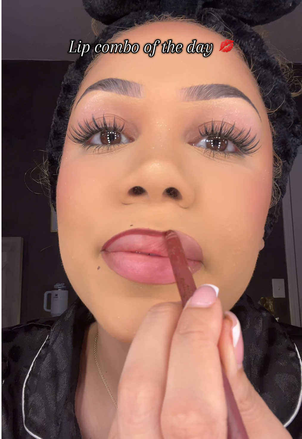 TikTok post by @nirhuc for Makeup Revolution. Caption reads: [...] lip liner in ‘vampire laws’ 🧛🏼‍♀️ @Makeup....