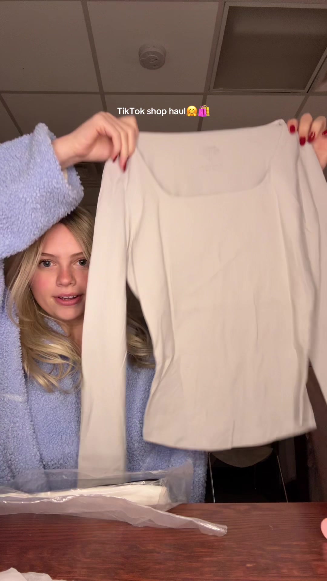 TikTok post by @lucyscafati22 for Automet. Caption reads: Hiii click the link for these new tops im so....