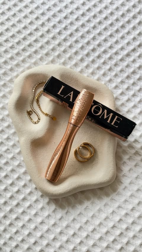 Instagram post by @andreasansonm for Lancôme. Caption reads: The eyes are the mirror of the soul. Let your gaze....