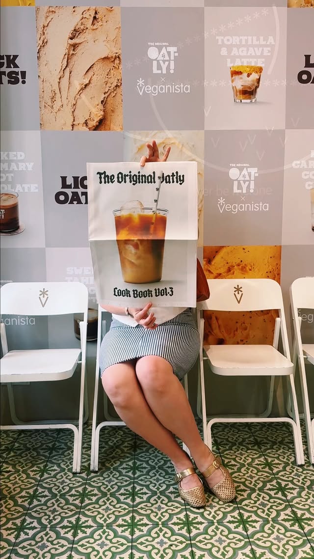 Instagram post by @caseycwolf for Oatly. Caption reads: [...] tolerable! |gifted| 📍Veganista x Oatly....