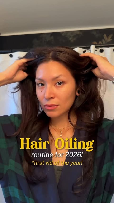 Instagram post by @juliageezy for Living Proof. Caption reads: First vid of 2026 and we’re hair oiling ✨ even on....