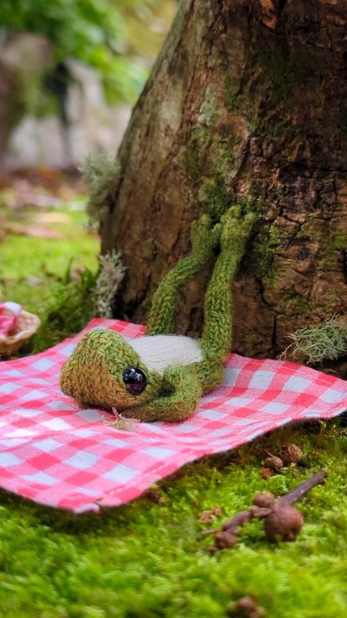 Instagram post by @indiarosecrawford for WeTransfer. Caption reads: AD| Frog faces a creative block 🎨 Go to....