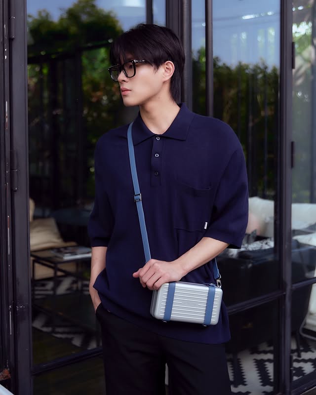 Instagram post by @kinn_ts for RIMOWA. Caption reads: A touch of blue💙 @RIMOWA 
#RIMOWA #RIMOWAPersonal.