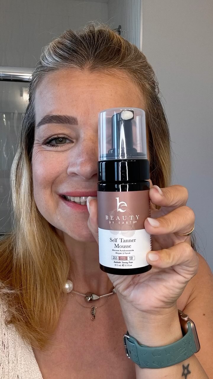 Instagram post by @island_mama_life for Beauty By Earth. Caption reads: [...] hello to my summer glow in a bottle!....