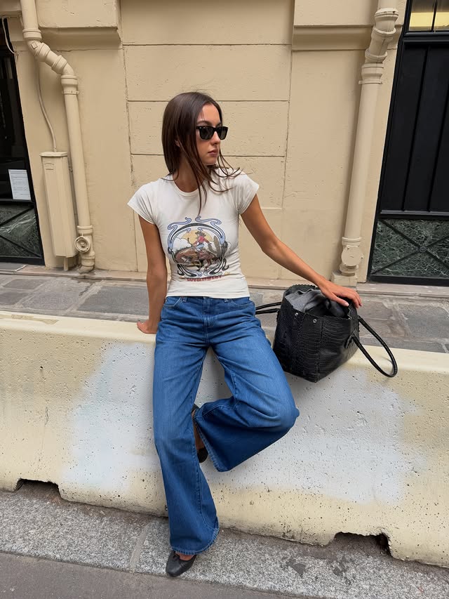 Instagram post by @laraaceliaa for Zalando. Caption reads: [...] white t-shirt combo!♥️ @wrangler_europe....