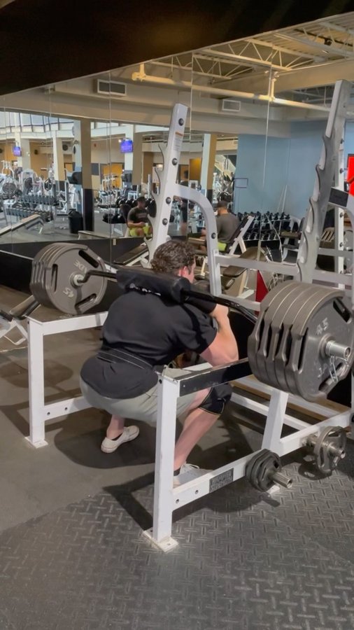 Instagram post by @andre.the.vaillant for Bells of Steel. Caption reads: [...] WIN a free Safety Squat Bar from Bells of....