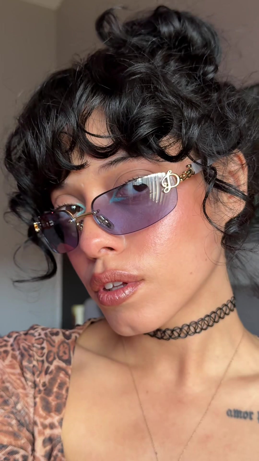 TikTok post by @yadeemua for DEZI. Caption reads: Just got my new @DEZI EYEWEAR sunglasses in BBY....