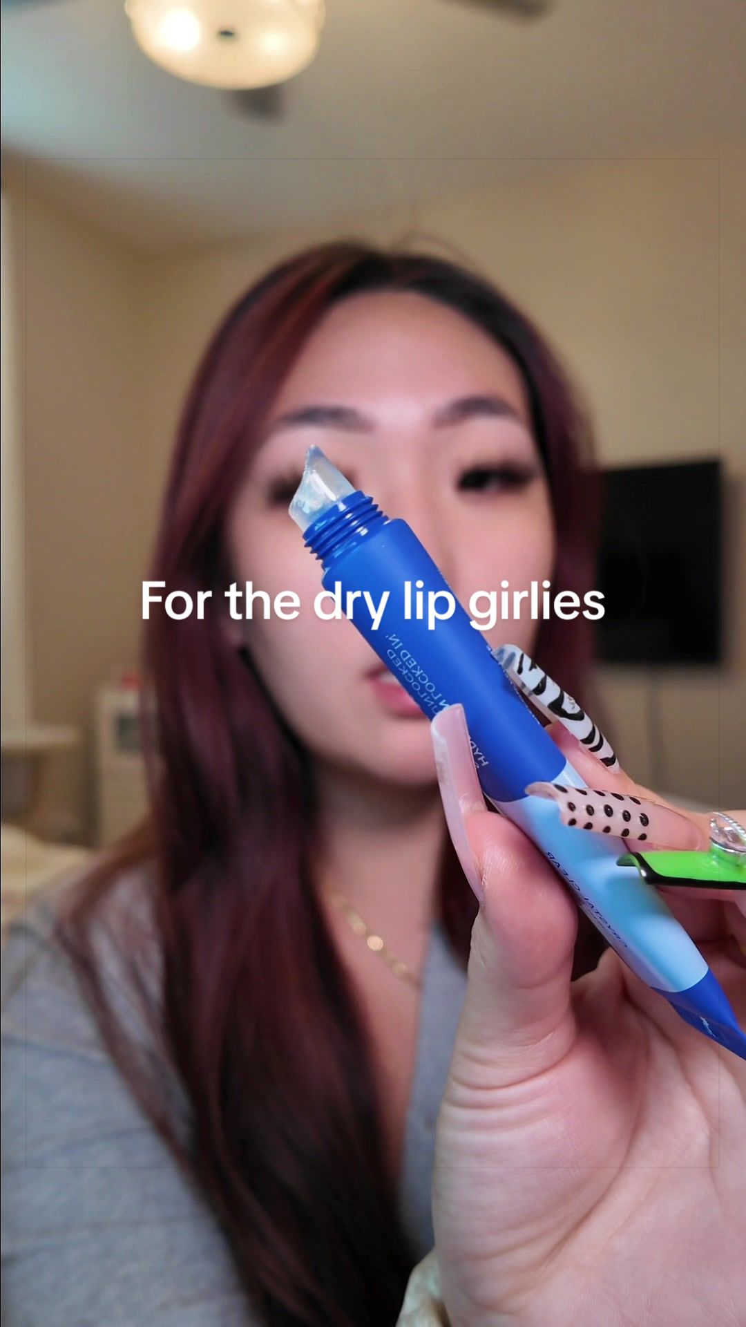 TikTok post by @pxriscilla for Knemo Beauty. Caption reads: Dry lip girlies try this one out @KNEMO™ 🫦 #knemo....