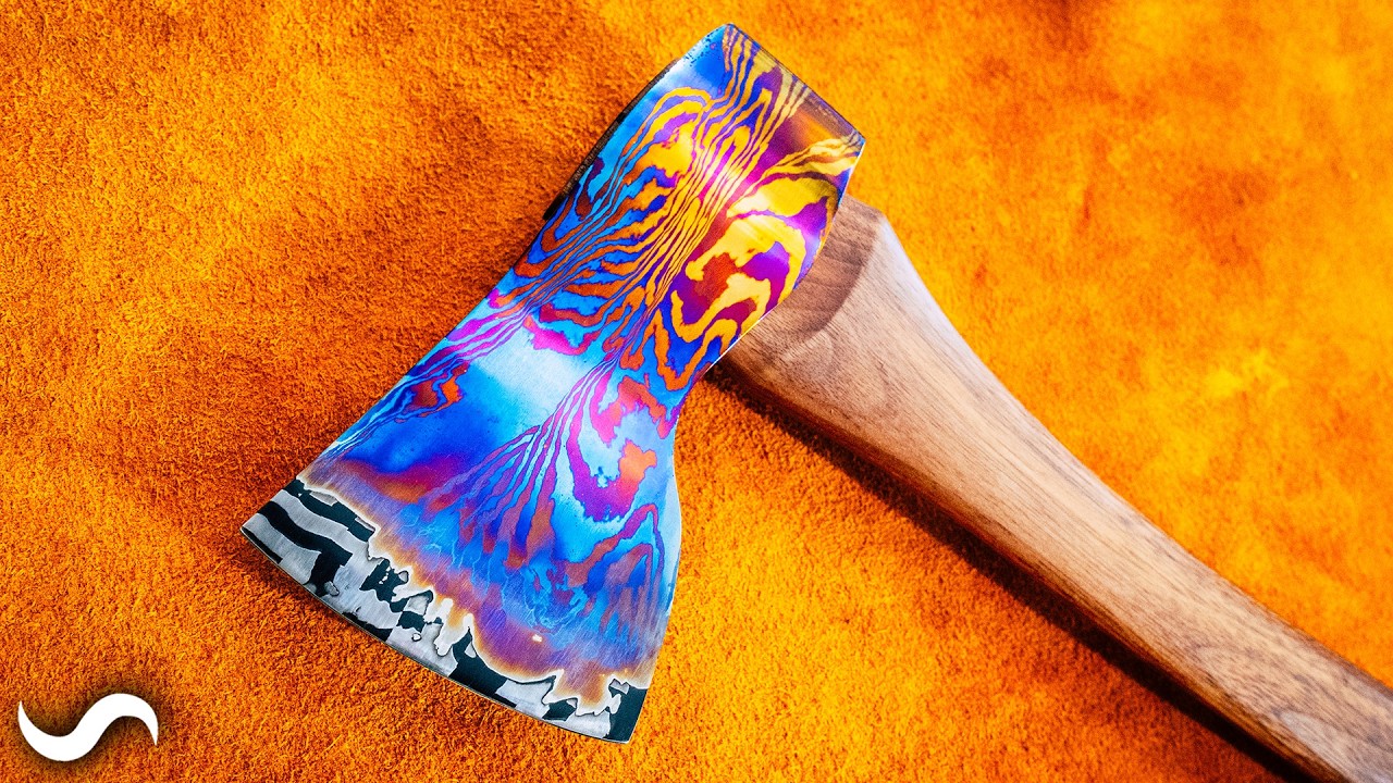 YouTube post by @AlecSteele for Soundstripe. Caption reads: Titanium Damascus Axe - Part 4.