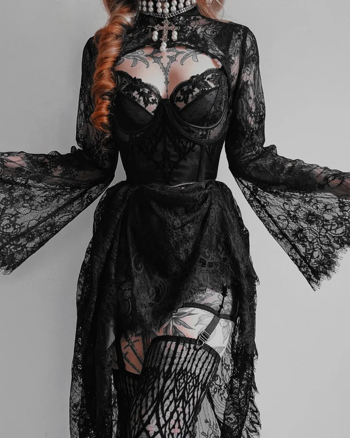 Instagram post by @kllsym for Blackmilk Clothing. Caption reads: [...] are 🖤 lace shrug and skirt from....