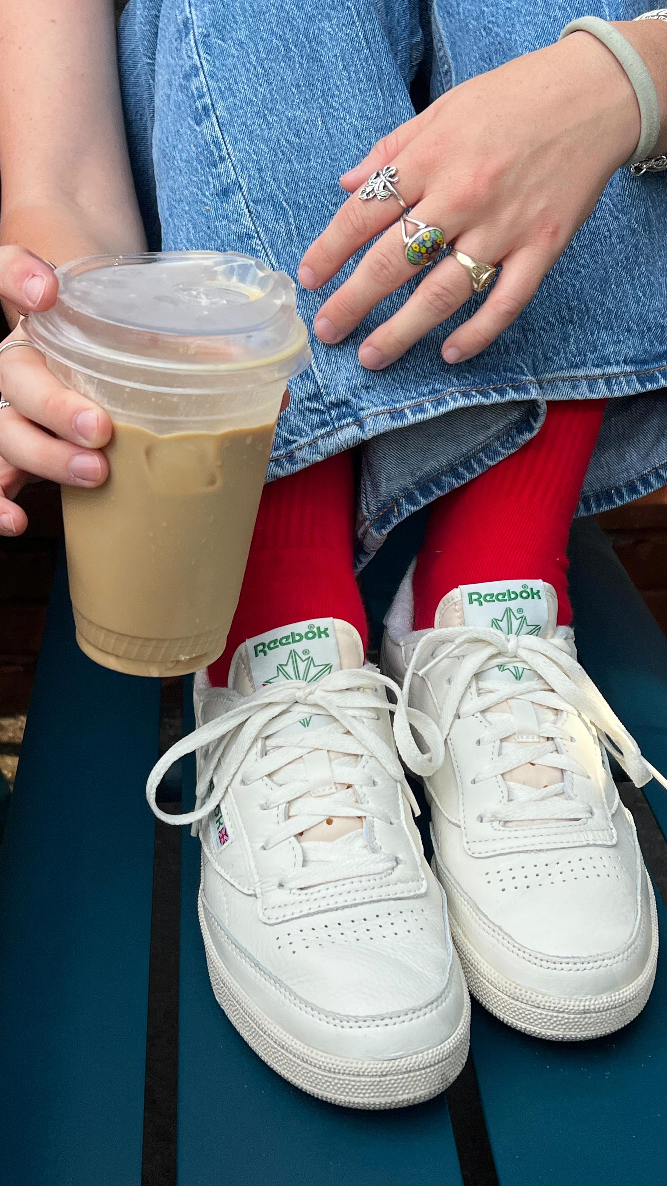 Instagram post by @sallydarrgriffin for Reebok. Caption reads: a walk in my @reebok sneakers from @journeys 👟✨....