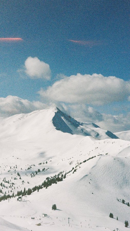 Instagram post by @grace_donner for Halfdays. Caption reads: A chairlift chat with a fellow @halfdays gal!!....