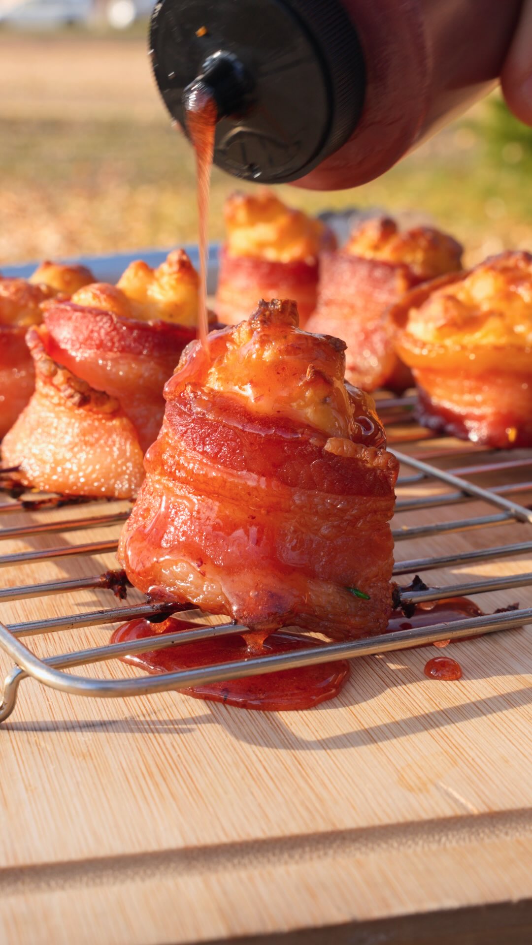 Instagram post by @redwhiteandbbq for Kingsford. Caption reads: Holiday Pig Shots 🥓🍯

These are my favorite BBQ....