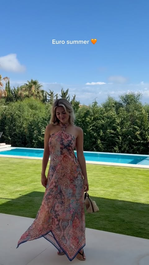 Instagram post by @xmeliina for H&M. Caption reads: [...] long dresses and golden sunsets 🌸✨ with @hm.