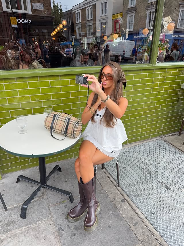 Instagram post by @carlyacton_ for Office Shoes. Caption reads: [...] @drmartensofficial 🛵🧁🥨🌷💕💕👢 ad....