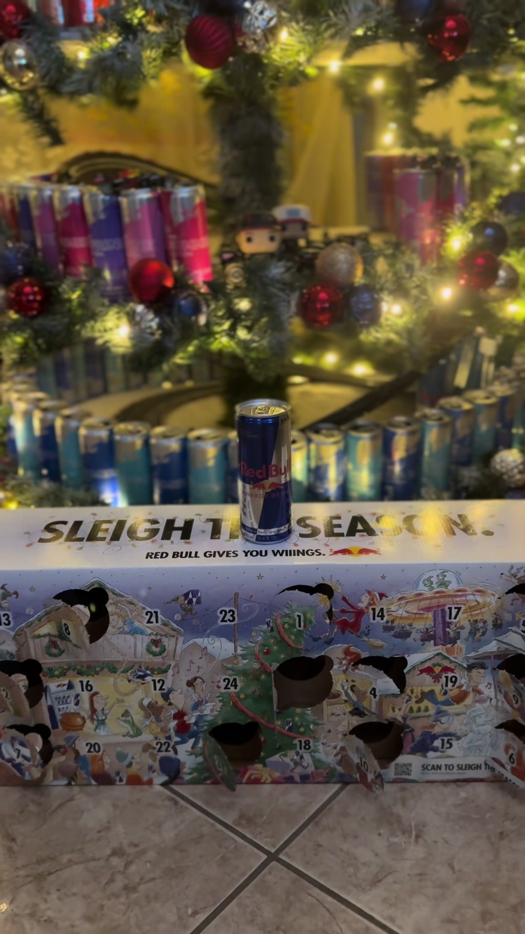 TikTok post by @selaanaya22 for Red Bull. Caption reads: Day 11 of opening my redbull advent calendar💙....