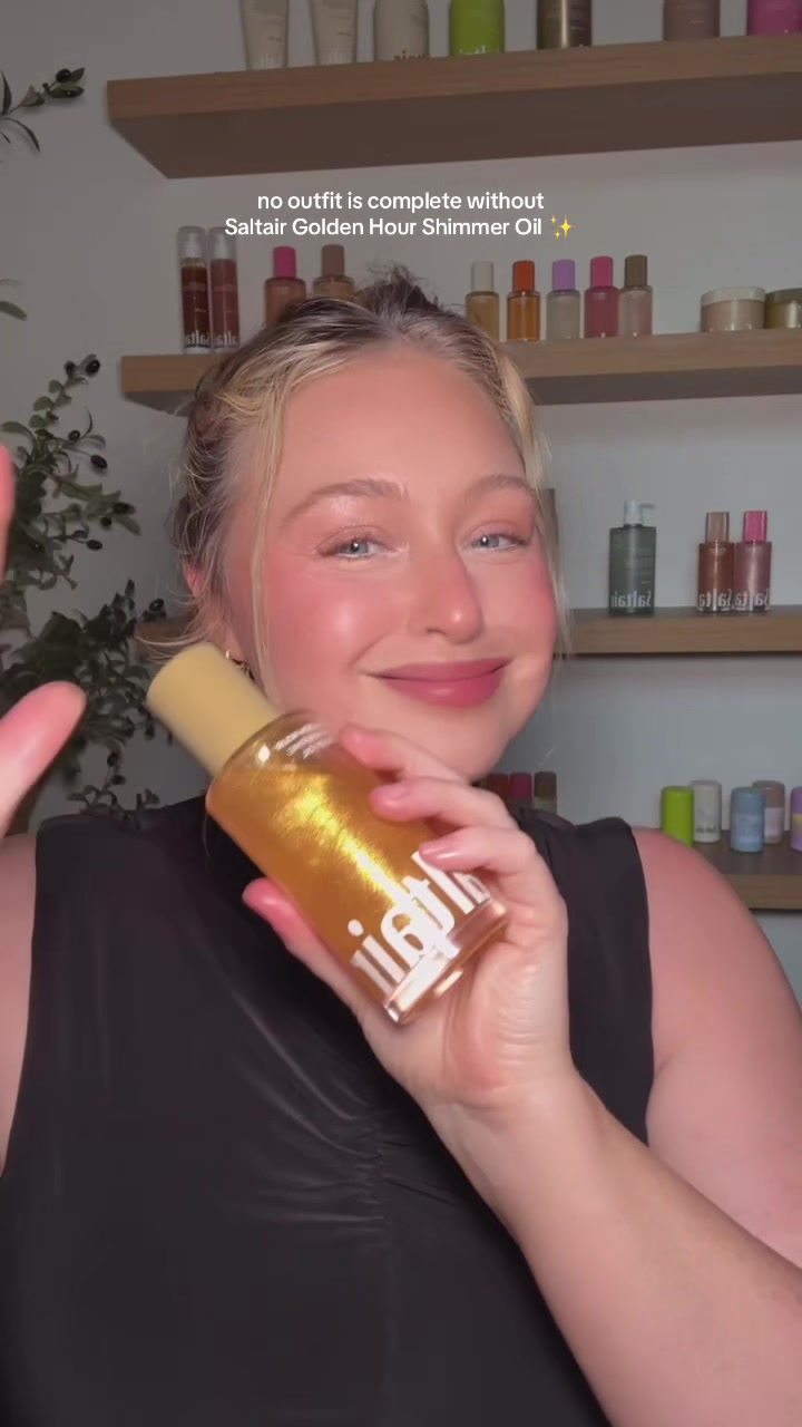 TikTok post by @iskra for Saltair. Caption reads: [...] of course I’m layering on my @Saltair Body....